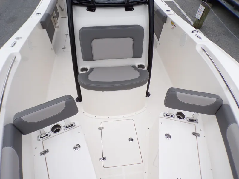 Slide: The Image of 2024 Sea Born SX 239 boat interior with seating and storage compartments. - 10