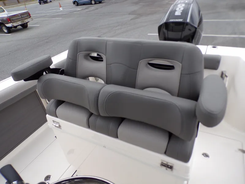 Slide: The Image of 2024 Sea Born SX 239 boat with dual gray cushioned seats and armrests. - 15