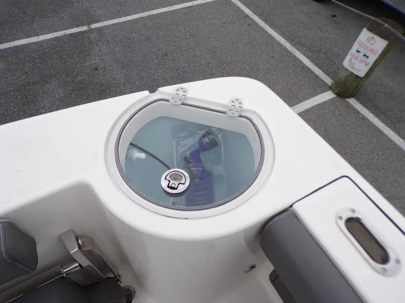 Slide: The Image of 2024 Sea Born SX 239 boat livewell in a parking lot. - 18