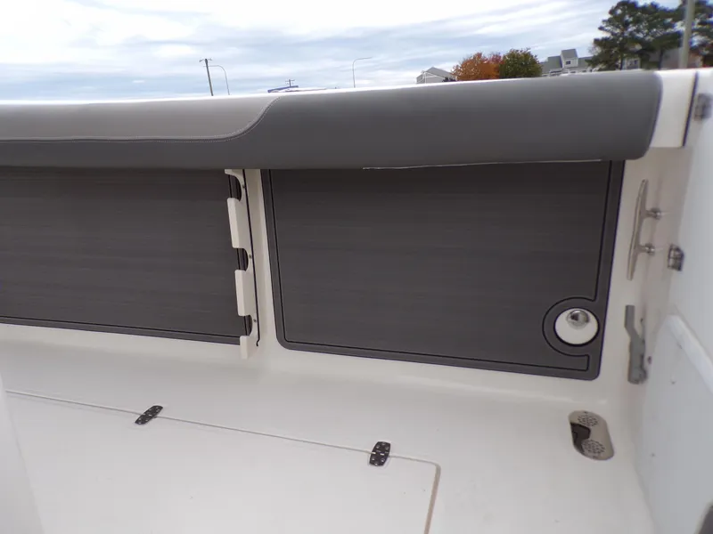 Slide: The Image of 2024 Sea Born SX 239 boat interior storage compartments. - 21