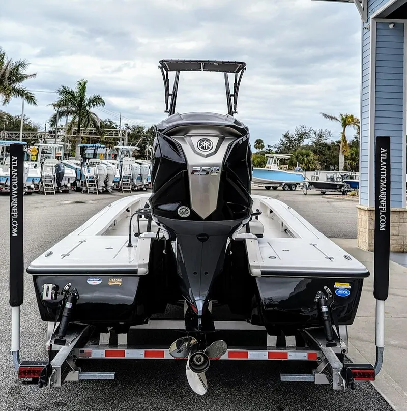 Slide: The Image of 2024 Tidewater 23 TPC Raptor boat on trailer, outdoor display. - 7