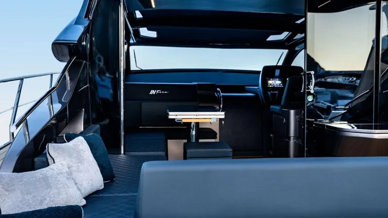 Slide: The Image of Luxury interior of 2024 Rizzardi In Five yacht with modern seating and helm. - 2