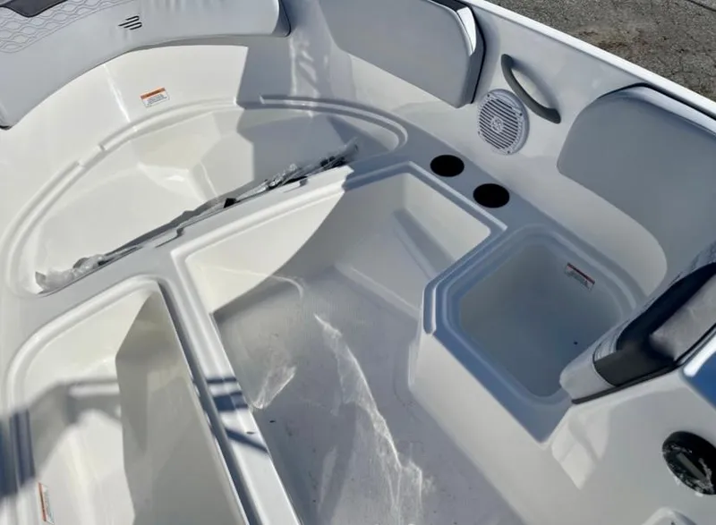 Slide: The Image of 2024 Bayliner Element M15 boat interior with seating and storage compartments. - 11