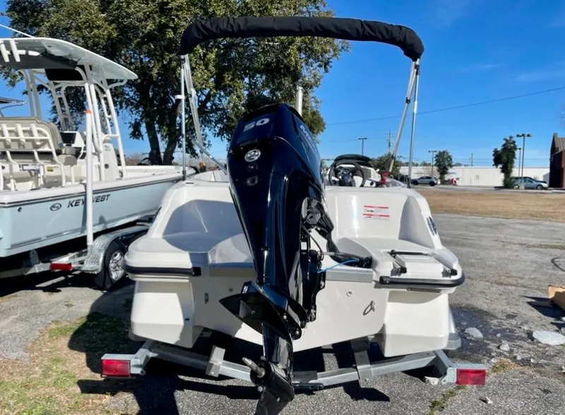 Slide: The Image of 2024 Bayliner Element M15 boat with outboard motor, rear view. - 3