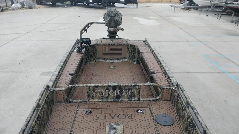 Slide: The Image of 2022 Prodigy 18x60 Marsh Tuff boat with camo design and spacious deck. - 7