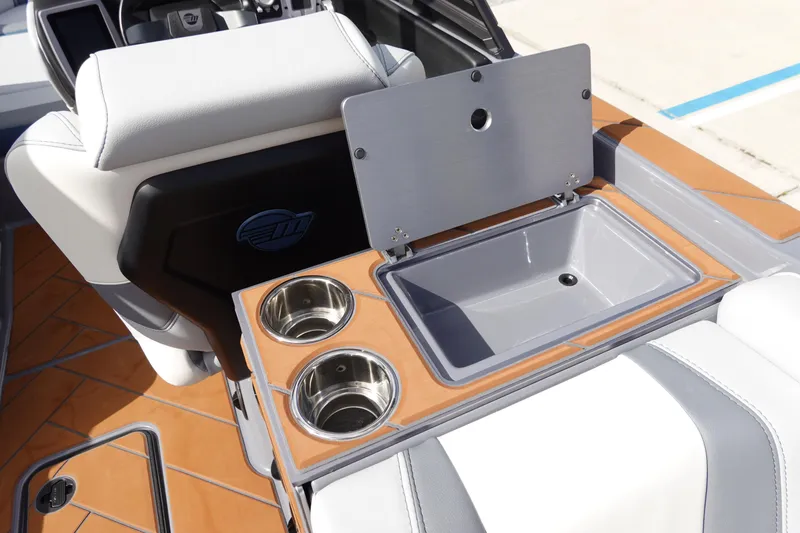 Slide: The Image of 2023 Malibu 25 LSV boat interior with sink and cup holders. - 22