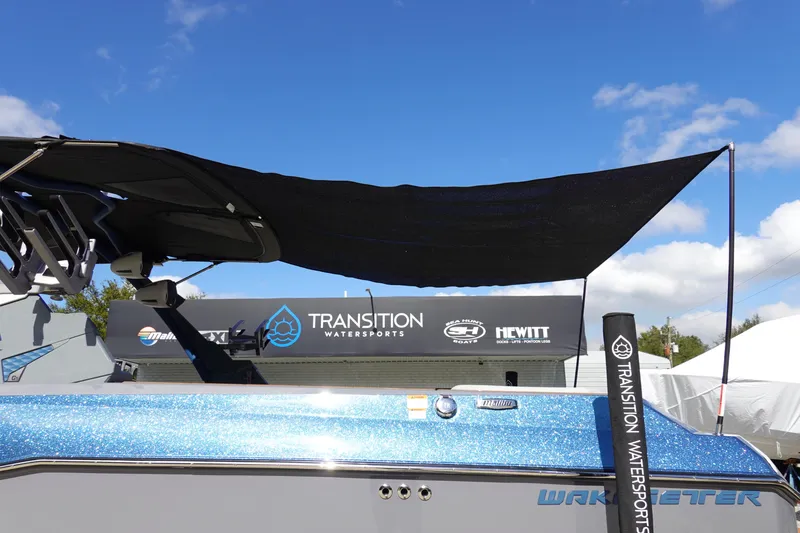 Slide: The Image of 2023 Malibu 25 LSV boat at Transition Watersports dealership. - 49