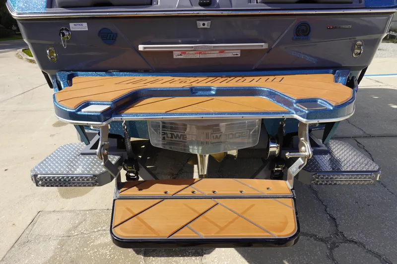 Slide: The Image of 2023 Malibu 25 LSV boat rear deck and swim platform. - 6