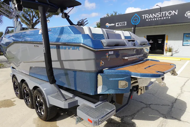 Slide: The Image of 2023 Malibu 25 LSV boat at Transition Watersports dealership. - 7