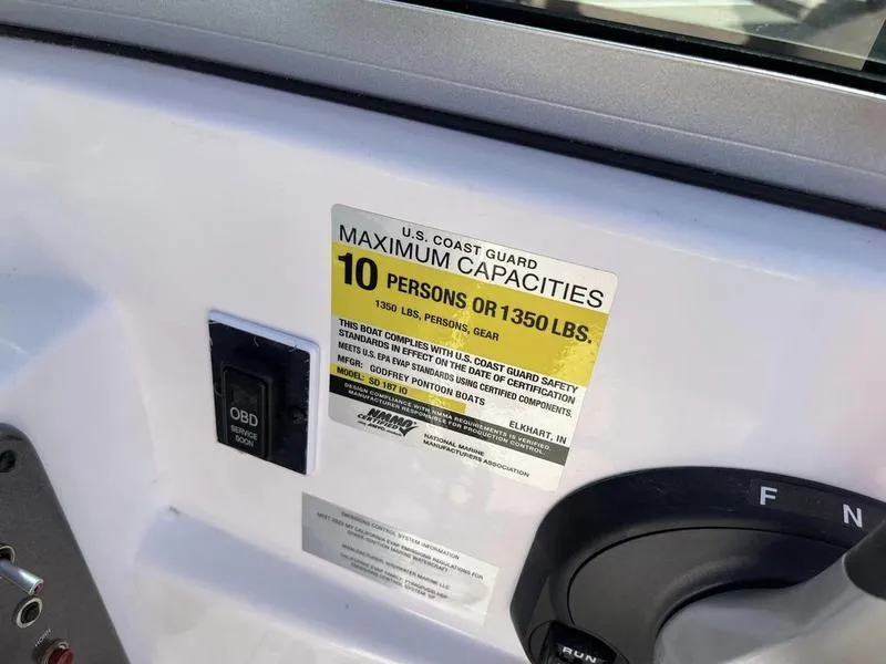 Slide: The Image of 2023 Hurricane SD187-IO boat capacity label, 10 persons or 1350 lbs, U.S. Coast Guard compliant. - 17