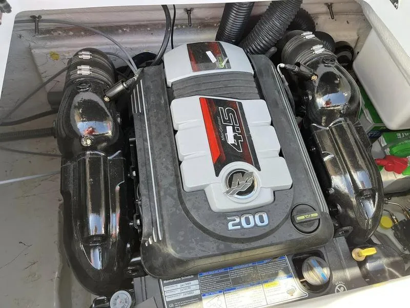 Slide: The Image of 2023 Hurricane SD187-IO boat engine compartment with 4.5L 200 HP MerCruiser engine. - 19