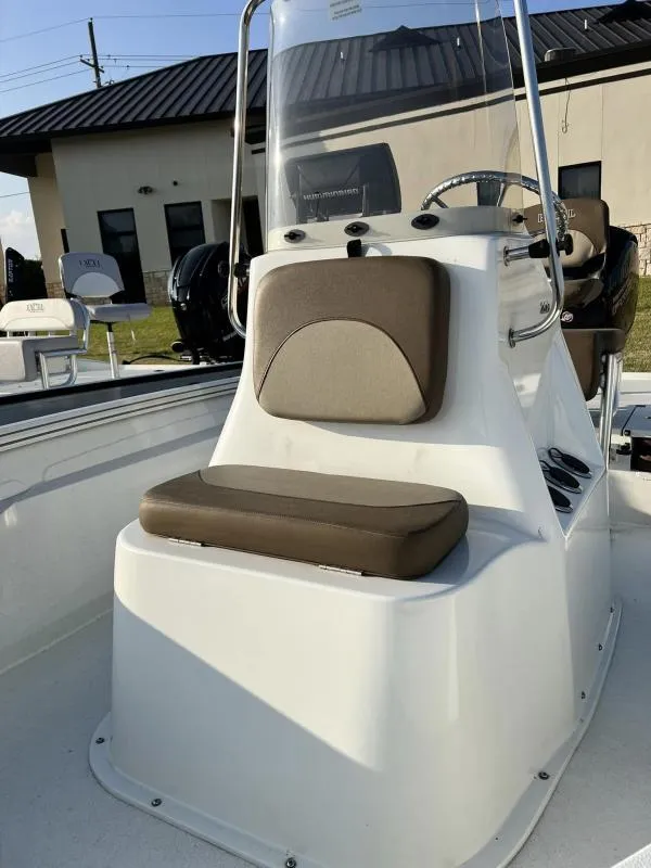 Slide: The Image of 2023 Excel Boats 203 Bay Pro center console with cushioned seating. - 12