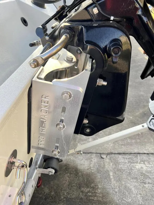 Slide: The Image of Close-up of the 2023 Excel Boats 203 Bay Pro's Pro Hi-Jacker motor mount. - 19