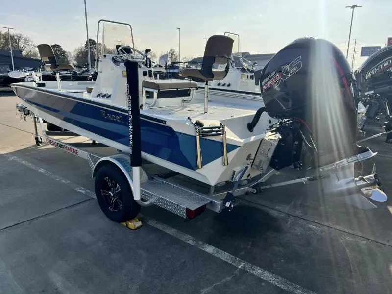 Slide: The Image of 2023 Excel Boats 203 Bay Pro on trailer with Mercury Pro XS outboard motor. - 4