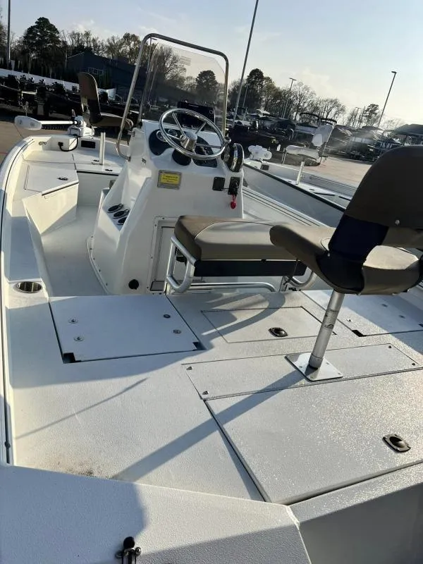 Slide: The Image of 2023 Excel Boats 203 Bay Pro, center console, spacious deck, comfortable seating, ideal for fishing. - 6