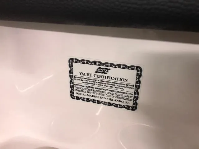 Slide: The Image of 2021 Regal LS6 yacht certification label, NMMA compliance, Regal Marine Industries, Orlando, FL. - 12
