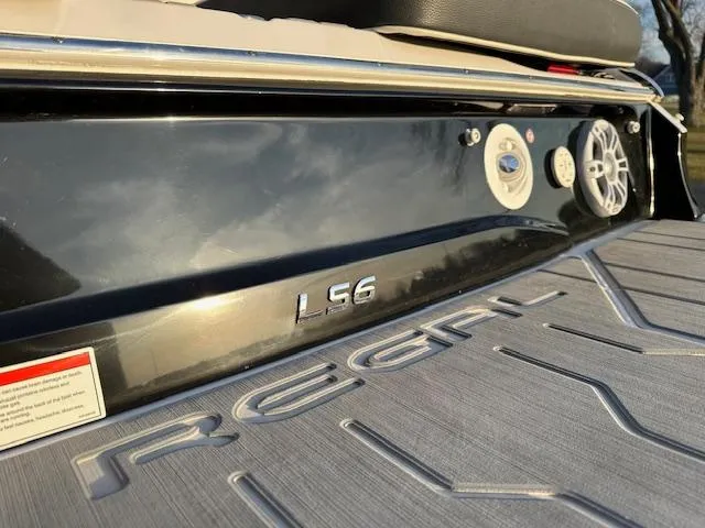 Slide: The Image of 2021 Regal LS6 boat rear view with logo and speaker. - 16