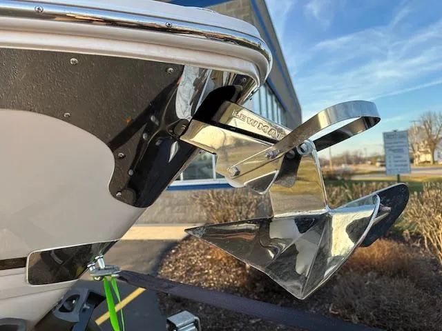 Slide: The Image of 2021 Regal LS6 boat with a polished anchor in the foreground. - 19