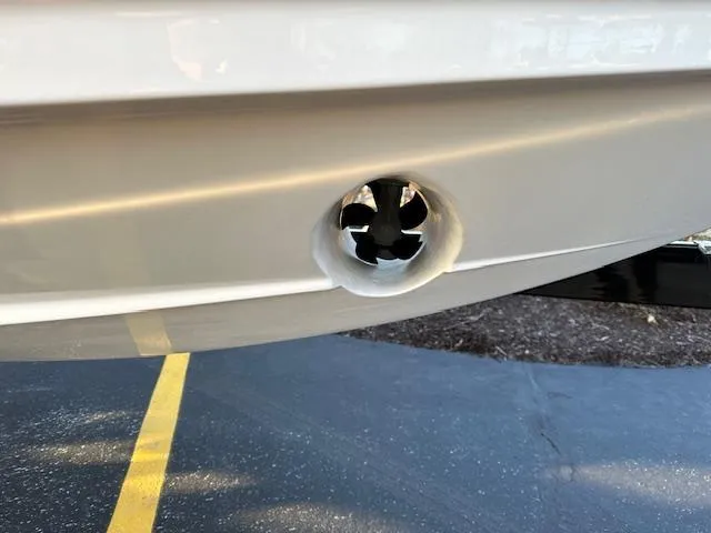 Slide: The Image of Close-up of a 2021 Regal LS6 boat hull with a drain plug. - 20