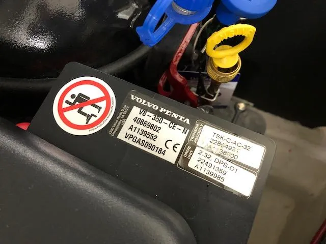 Slide: The Image of Close-up of Volvo Penta engine label on 2021 Regal LS6 boat. - 30