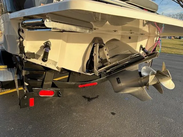 Slide: The Image of 2021 Regal LS6 boat stern with dual propeller outdrive. - 32