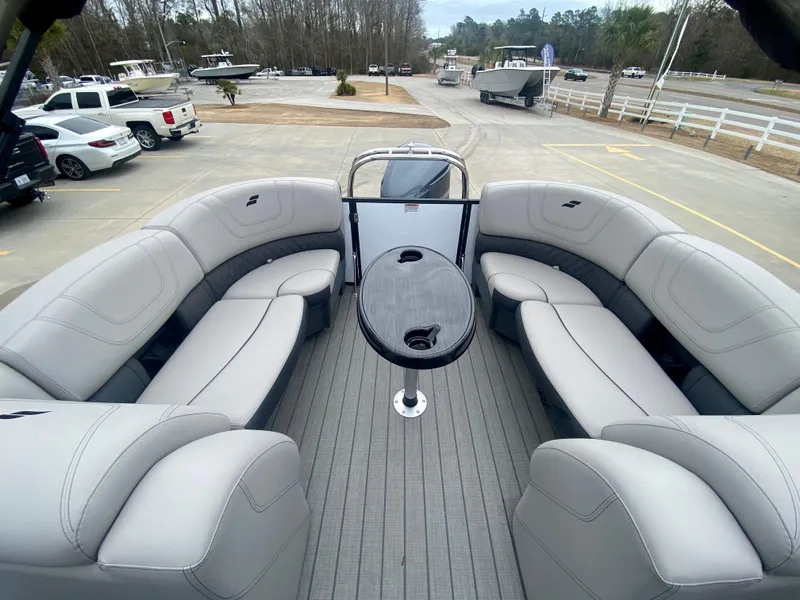 Slide: The Image of 2023 Starcraft SLS 3 boat interior with gray seating and central table. - 6