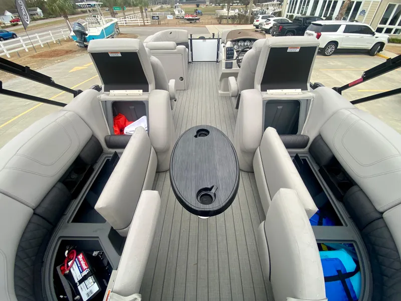 Slide: The Image of 2023 Starcraft SLS 3 boat interior with seating and storage compartments. - 7
