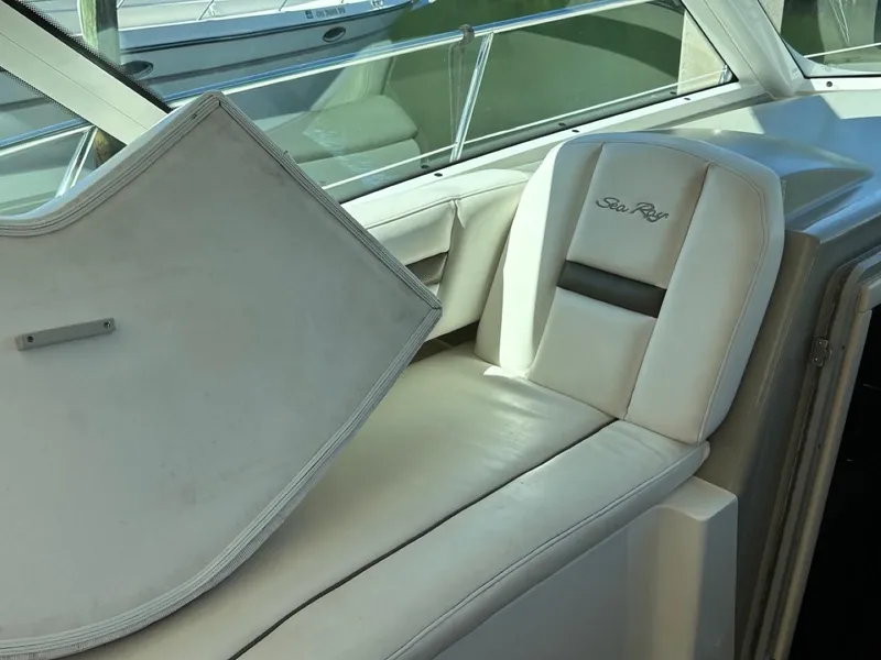 Slide: The Image of Interior seating of 2006 Sea Ray 48 Sundancer yacht with white upholstery. - 3