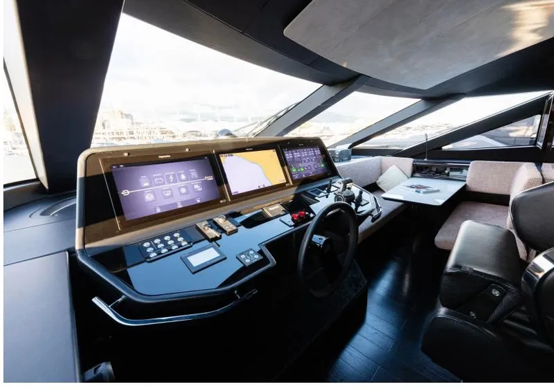 Slide: The Image of 2024 Posillipo Technema 90 yacht cockpit with advanced navigation systems. - 16