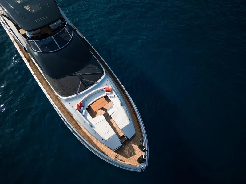 Slide: The Image of Aerial view of 2024 Posillipo Technema 90 luxury yacht on blue water. - 3