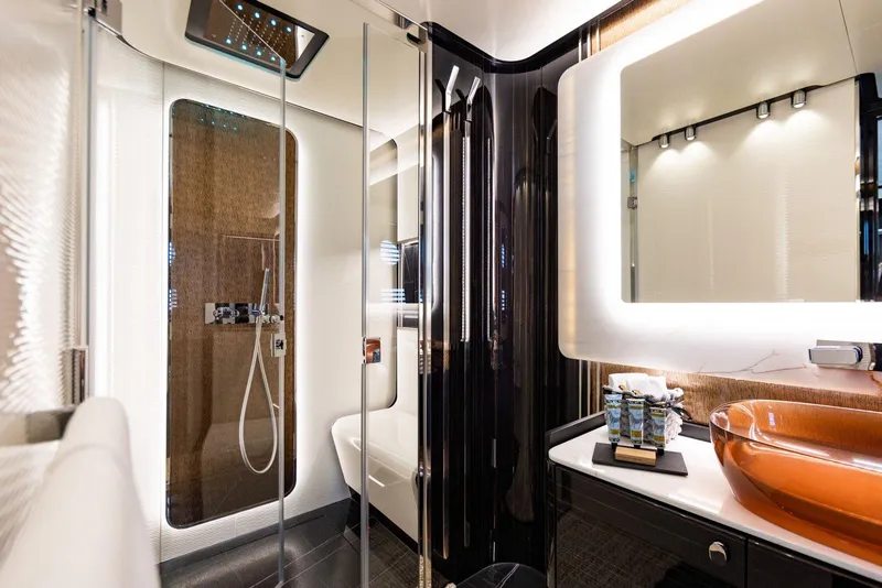 Slide: The Image of Luxurious bathroom in 2024 Posillipo Technema 90 yacht with modern fixtures and glass shower. - 9