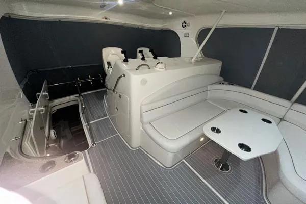 Slide: The Image of 2006 Silverton 50 Convertible yacht interior with seating and table. - 11