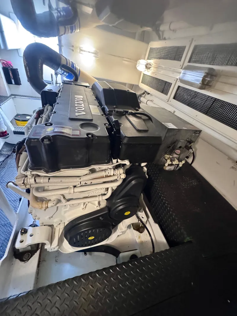 Slide: The Image of Engine room of 2006 Silverton 50 Convertible with Kohler power system and Craftsman toolbox. - 17