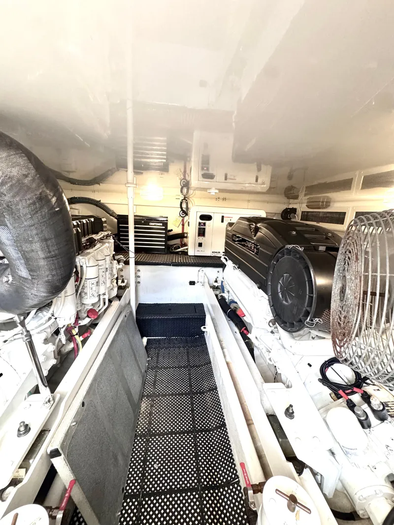 Slide: The Image of Engine room of a 2006 Silverton 50 Convertible yacht with Volvo engine. - 18