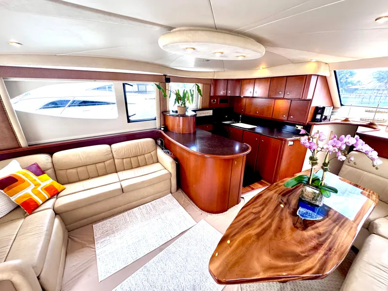 Slide: The Image of Luxurious interior of a 2006 Silverton 50 Convertible yacht with modern amenities. - 26