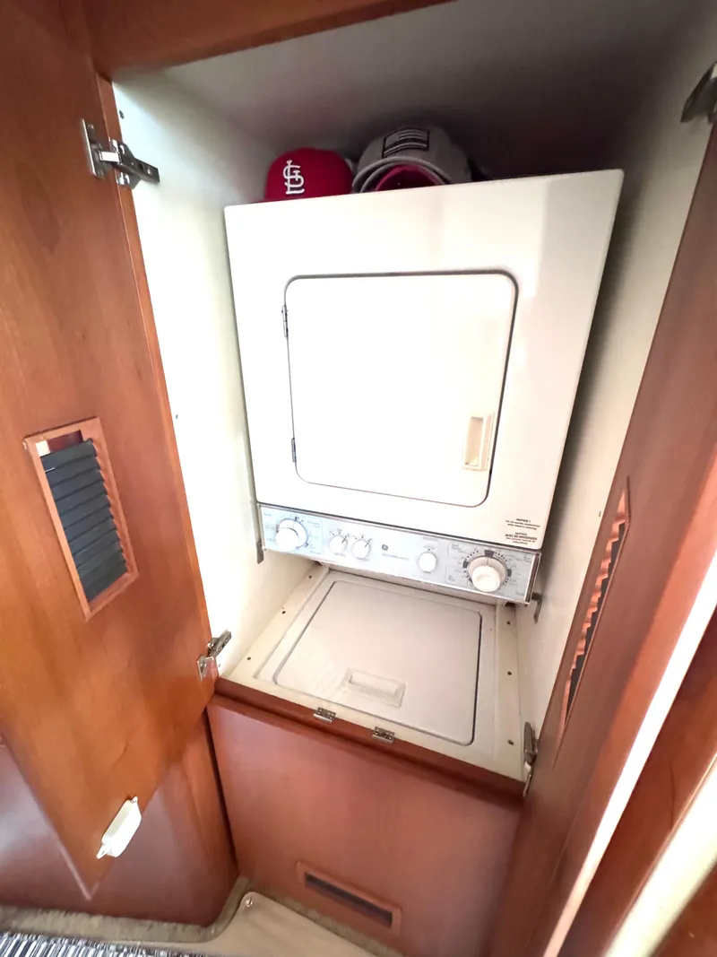 Slide: The Image of Luxurious bathroom in 2006 Silverton 50 Convertible yacht with modern fixtures and elegant design. - 36