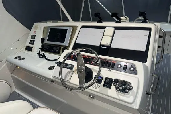 Slide: The Image of 2006 Silverton 50 Convertible yacht docked at marina. - 5