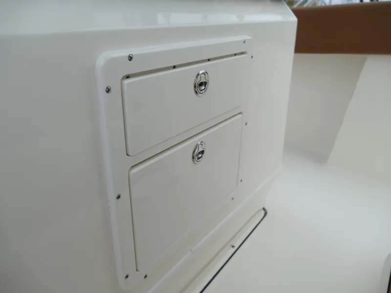 Slide: The Image of 2024 Pioneer 270 Pelagic boat storage compartments. - 28