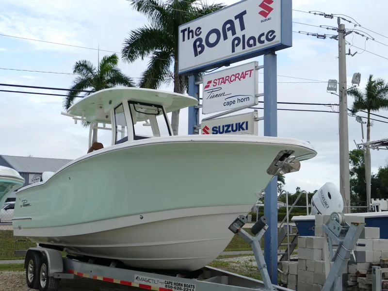 Slide: The Image of 2024 Pioneer 270 Pelagic boat on trailer at The Boat Place dealership. - 3