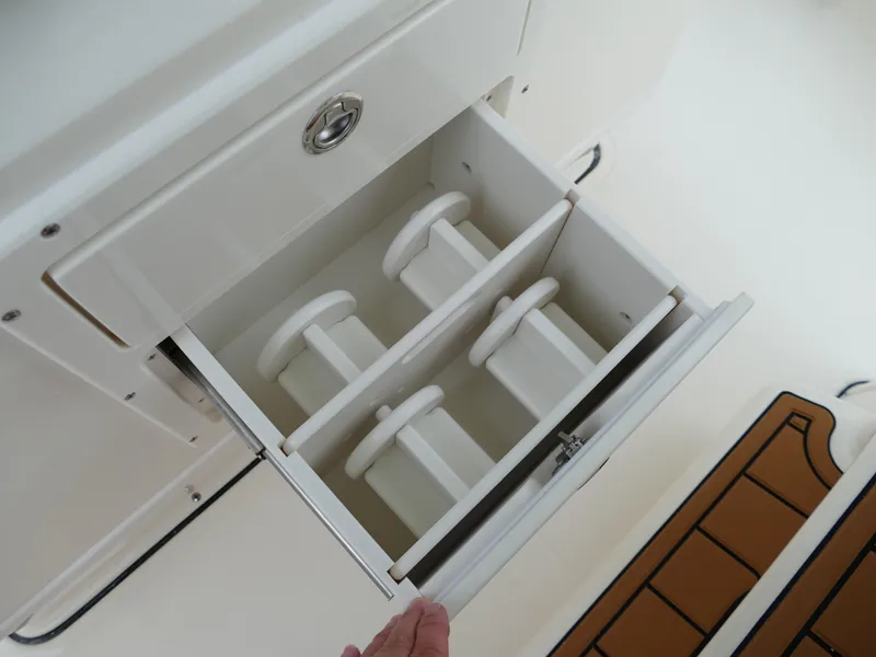 Slide: The Image of Open storage drawer in 2024 Pioneer 270 Pelagic boat. - 30