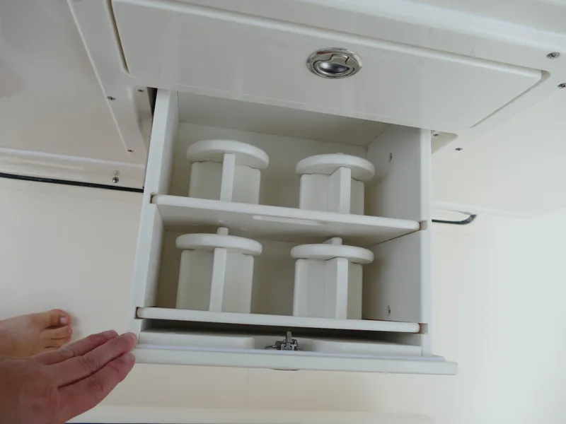 Slide: The Image of Open storage compartment in 2024 Pioneer 270 Pelagic boat. - 31