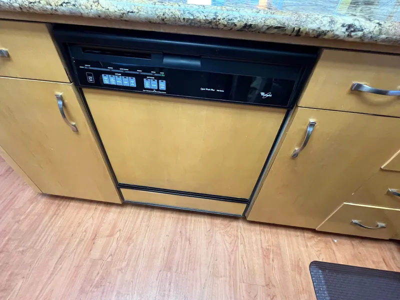 Slide: The Image of Built-in dishwasher in 1999 Hatteras 74 Sport Deck Motor Yacht kitchen. - 40