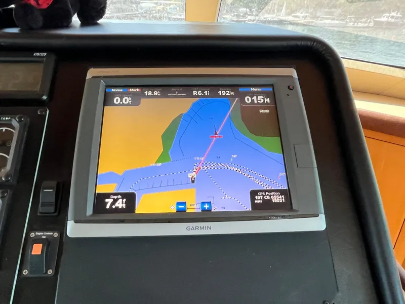Slide: The Image of Navigation system on 1999 Hatteras 74 Sport Deck Motor Yacht displaying marine chart. - 45