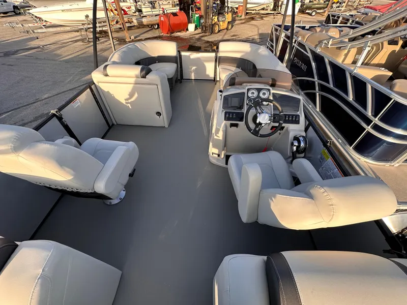 Slide: The Image of 2023 Sylvan Mirage X X3 pontoon boat interior with seating and helm. - 7