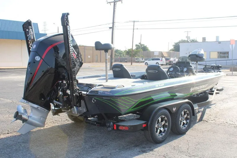 Slide: The Image of 2024 Phoenix 721 Pro XP bass boat with powerful outboard motor. - 3