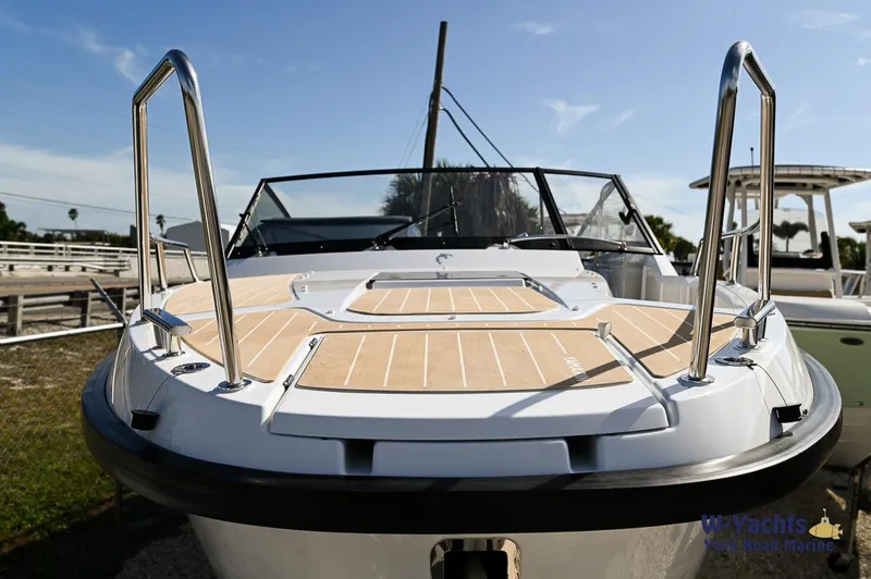 Slide: The Image of 2024 Yamarin 80 boat with sleek design and spacious deck. - 2