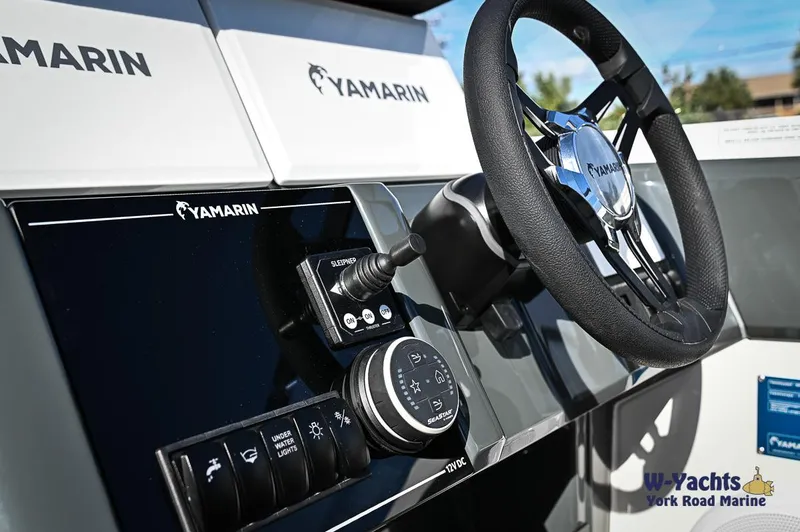 Slide: The Image of Control panel and steering wheel of the 2024 Yamarin 80 boat. - 20