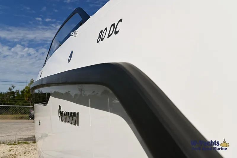 Slide: The Image of 2024 Yamarin 80 DC boat side view with logo and model details. - 24