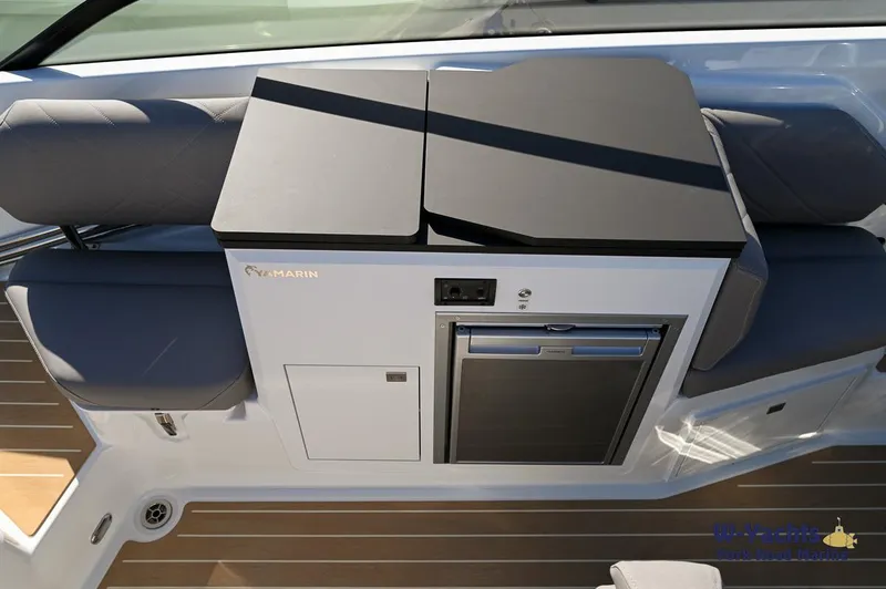 Slide: The Image of 2024 Yamarin 80 boat interior with seating and storage compartments. - 26