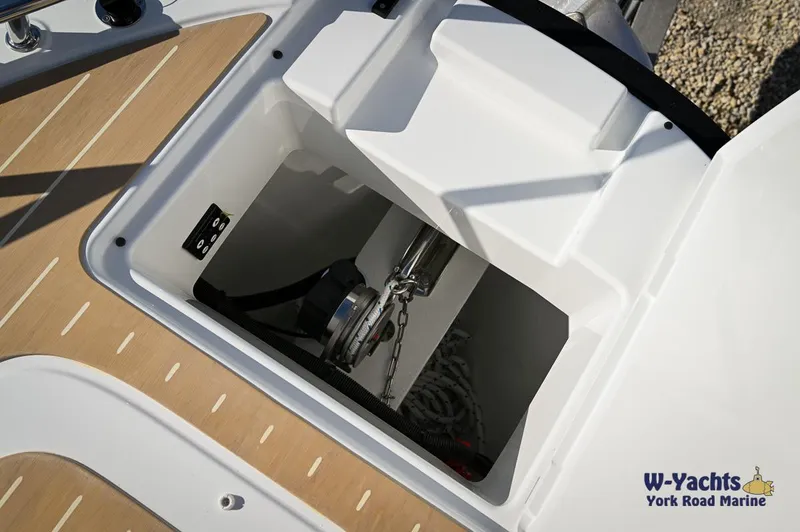 Slide: The Image of Yamarin 80 2024 boat anchor compartment with chain and winch system. - 4